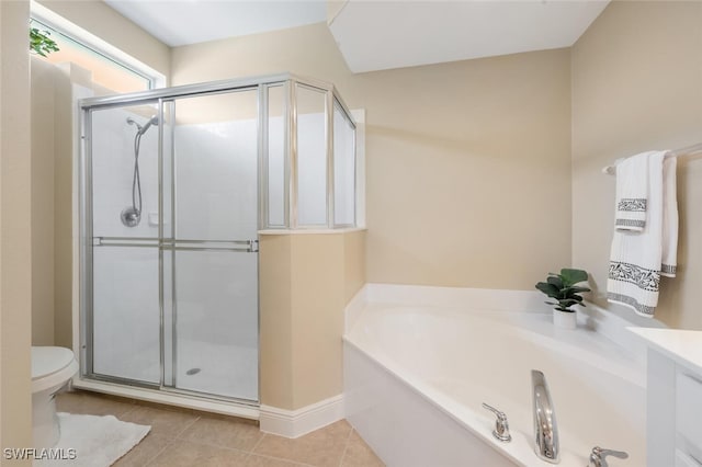bathroom featuring a stall shower, a bath, toilet, and tile patterned floors
