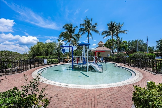 view of pool with fence