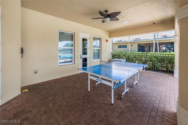 view of patio / terrace featuring ceiling fan and outdoor dining space