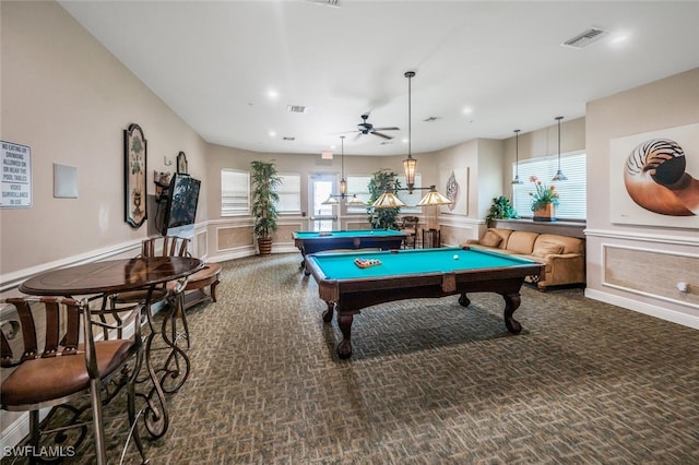 rec room with a ceiling fan, wainscoting, carpet floors, billiards table, and a decorative wall