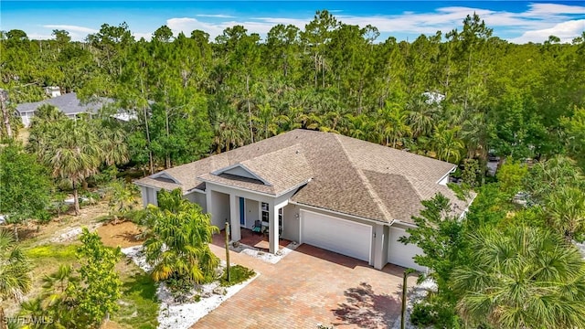 2712 14th Ave SE, Naples, FL 34117 - view from above of property with a heavily wooded area