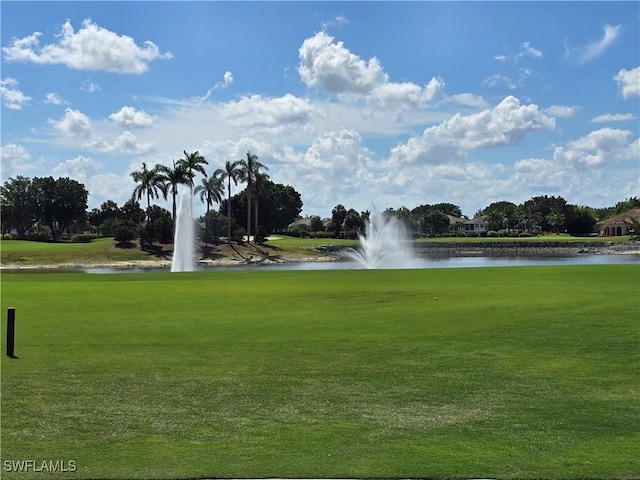 14572 Bellino Ter Unit 202, Bonita Springs, FL 34135 - surrounding community with a water view, a yard, and golf course view