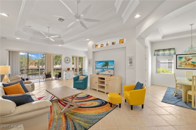 14572 Bellino Ter Unit 202, Bonita Springs, FL 34135 - living area featuring a raised ceiling, light tile patterned floors, ornamental molding, a ceiling fan, and recessed lighting