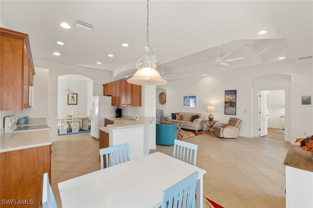 14572 Bellino Ter Unit 202, Bonita Springs, FL 34135 - dining space with light tile patterned flooring, arched walkways, visible vents, and recessed lighting