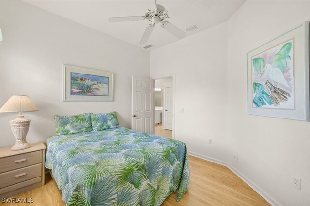 14572 Bellino Ter Unit 202, Bonita Springs, FL 34135 - bedroom with light wood-style floors, visible vents, baseboards, and ceiling fan