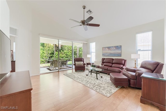 23061 Grassy Pine Dr, Estero, FL 33928 - living area featuring visible vents, light wood-style floors, ceiling fan, and a healthy amount of sunlight
