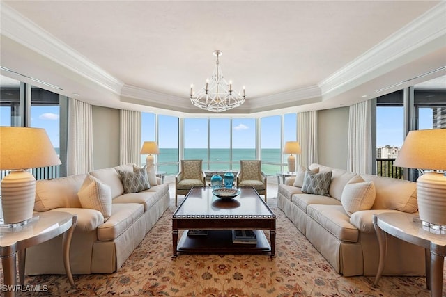 8477 Bay Colony Dr Unit 1102, Naples, FL 34108 - living room with crown molding, a raised ceiling, and a notable chandelier