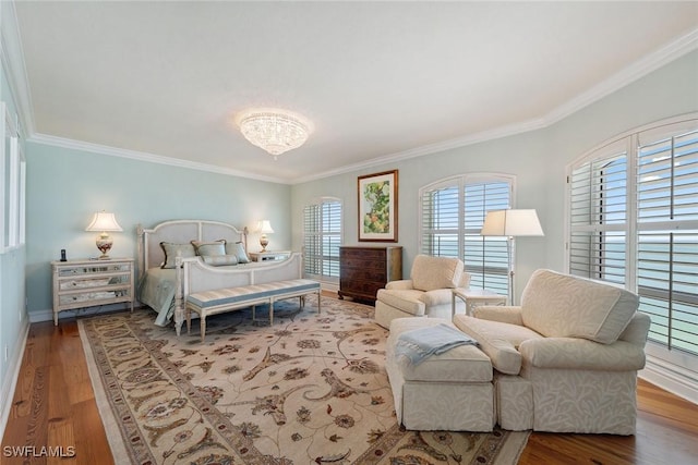 8477 Bay Colony Dr Unit 1102, Naples, FL 34108 - bedroom with crown molding, baseboards, wood finished floors, and a chandelier
