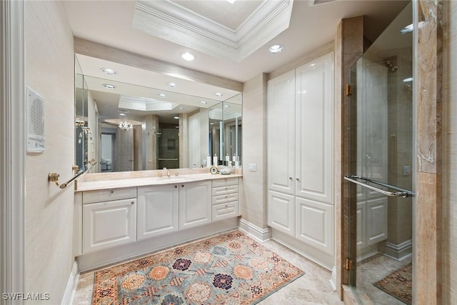 8477 Bay Colony Dr Unit 1102, Naples, FL 34108 - bathroom featuring vanity, a raised ceiling, ornamental molding, and a shower stall