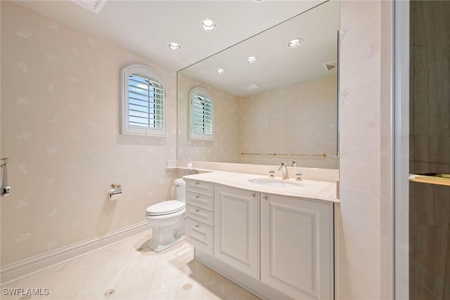 8477 Bay Colony Dr Unit 1102, Naples, FL 34108 - bathroom featuring vanity, baseboards, toilet, and wallpapered walls