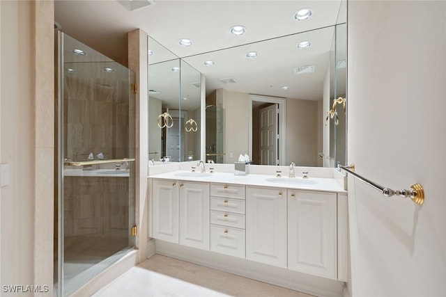 8477 Bay Colony Dr Unit 1102, Naples, FL 34108 - full bath with a sink, a stall shower, and double vanity