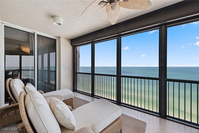 8477 Bay Colony Dr Unit 1102, Naples, FL 34108 - interior space with a water view and a textured ceiling
