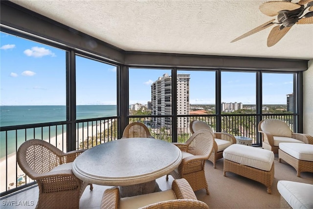 8477 Bay Colony Dr Unit 1102, Naples, FL 34108 - sunroom featuring a water view