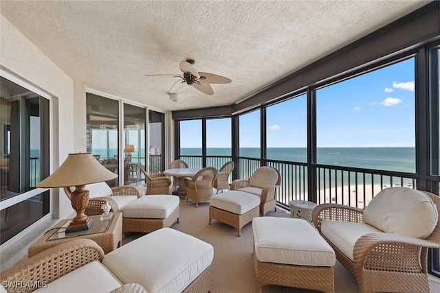 8477 Bay Colony Dr Unit 1102, Naples, FL 34108 - sunroom / solarium featuring a water view and a textured ceiling