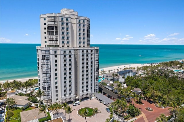 8477 Bay Colony Dr Unit 1102, Naples, FL 34108 - drone / aerial view featuring a beach view and a water view