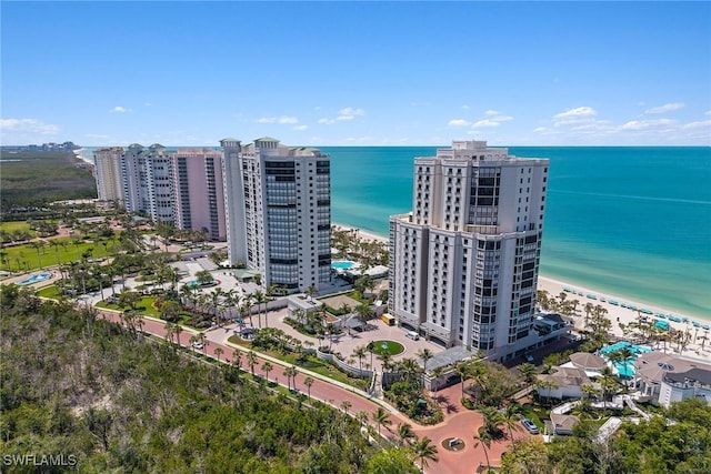 8477 Bay Colony Dr Unit 1102, Naples, FL 34108 - drone / aerial view featuring a water view and a city view