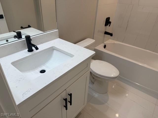 full bathroom featuring toilet, tile patterned floors, bathing tub / shower combination, and vanity