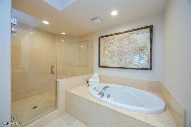 full bath with a garden tub, a shower stall, and recessed lighting