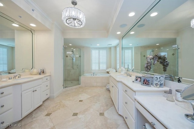 bathroom featuring a chandelier, a stall shower, ornamental molding, recessed lighting, and a garden tub