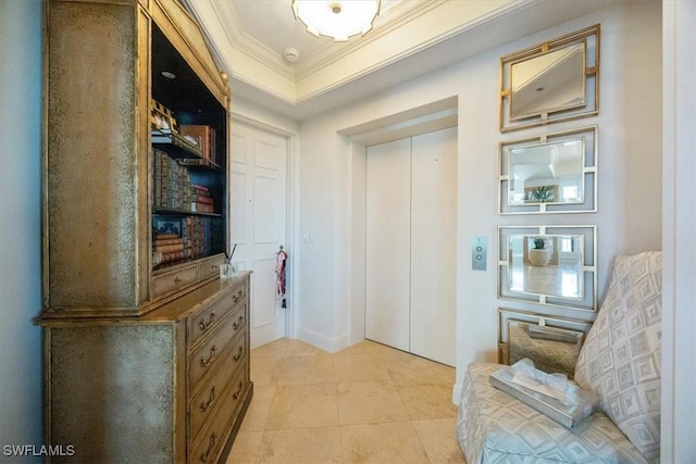 corridor featuring crown molding, light tile patterned floors, and elevator
