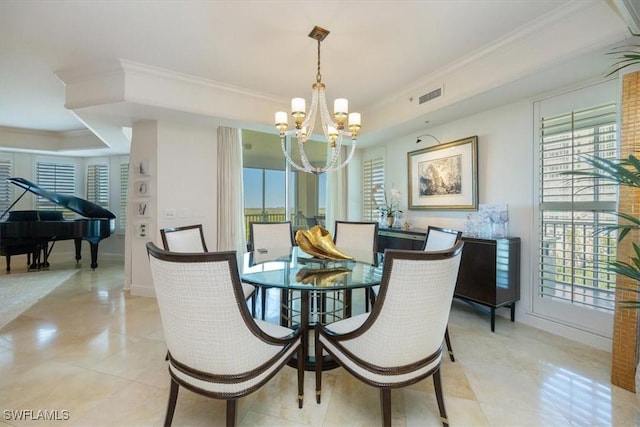 dining space featuring a chandelier, a tray ceiling, crown molding, and light tile patterned floors