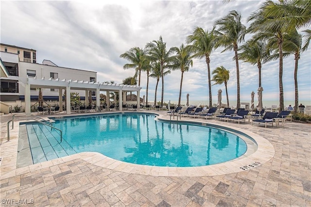 community pool featuring a patio area and a pergola