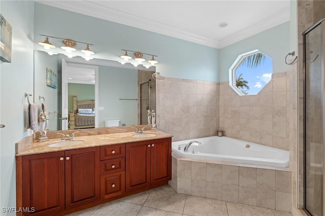 4938 Viceroy St Unit 107, Cape Coral, FL 33904 - bathroom featuring a garden tub, a sink, tile patterned flooring, and a stall shower