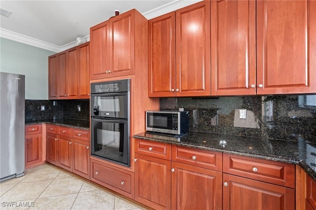 4938 Viceroy St Unit 107, Cape Coral, FL 33904 - kitchen featuring appliances with stainless steel finishes, dark stone counters, light tile patterned floors, backsplash, and ornamental molding