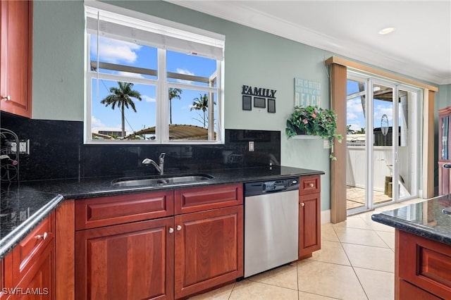 4938 Viceroy St Unit 107, Cape Coral, FL 33904 - kitchen featuring a sink, decorative backsplash, stainless steel dishwasher, and a wealth of natural light