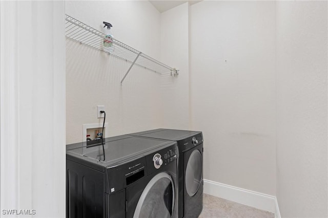 4938 Viceroy St Unit 107, Cape Coral, FL 33904 - clothes washing area featuring laundry area, baseboards, and independent washer and dryer