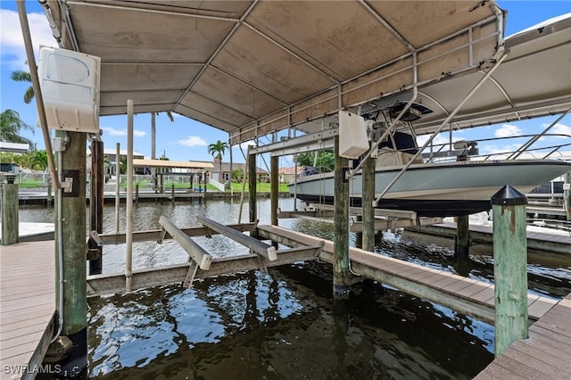 4938 Viceroy St Unit 107, Cape Coral, FL 33904 - dock area with boat lift and a water view
