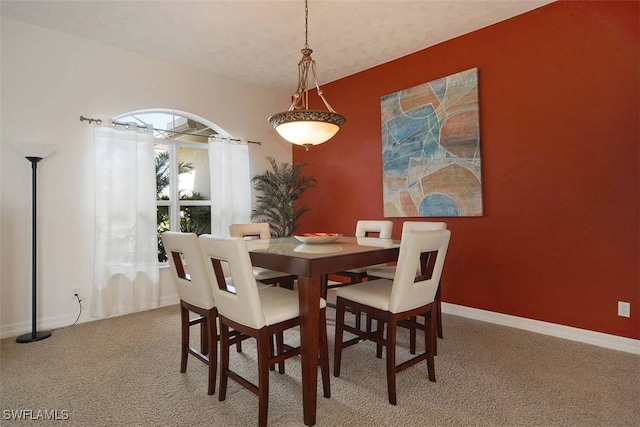 1725 SE 10th Pl, Cape Coral, FL 33990 - carpeted dining area featuring baseboards