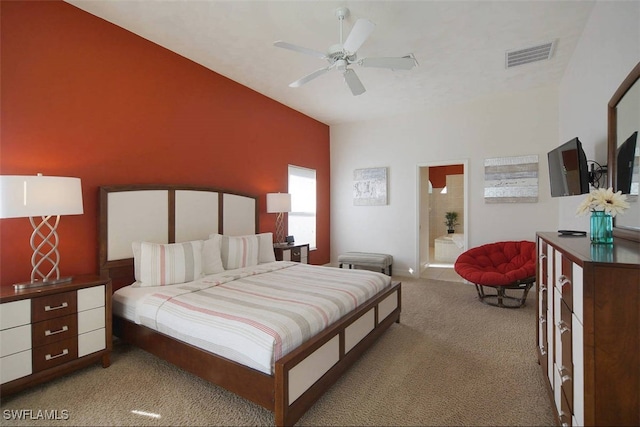 1725 SE 10th Pl, Cape Coral, FL 33990 - carpeted bedroom featuring ceiling fan, ensuite bath, and visible vents