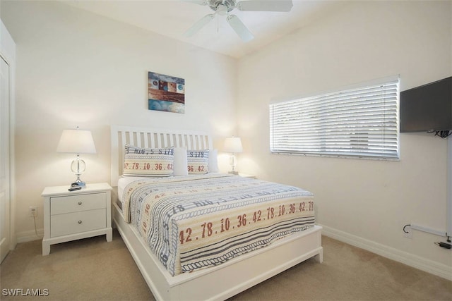 1725 SE 10th Pl, Cape Coral, FL 33990 - bedroom featuring baseboards, ceiling fan, and light carpet