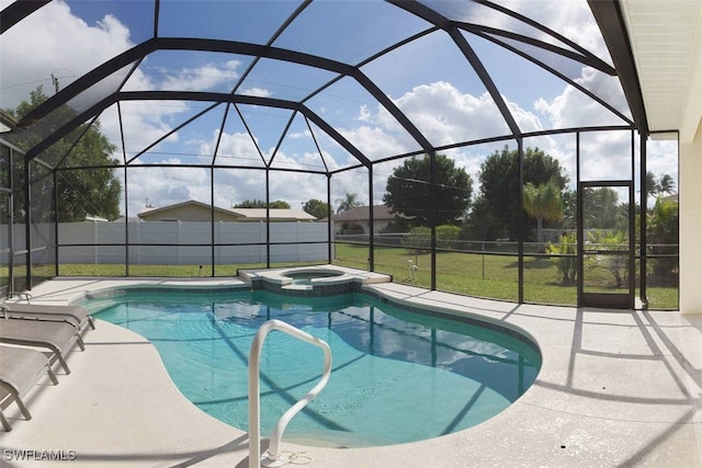 1725 SE 10th Pl, Cape Coral, FL 33990 - view of swimming pool featuring a lawn, glass enclosure, a pool with connected hot tub, and a patio