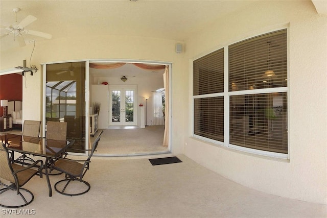 1725 SE 10th Pl, Cape Coral, FL 33990 - view of patio / terrace with ceiling fan and french doors