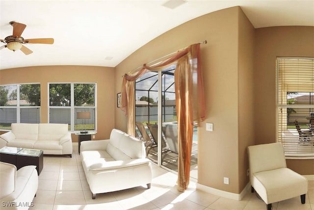 1725 SE 10th Pl, Cape Coral, FL 33990 - living area with baseboards, ceiling fan, and light tile patterned flooring