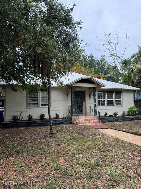 2739 Michigan Ave, Fort Myers, FL 33916 - view of front of house featuring a front yard