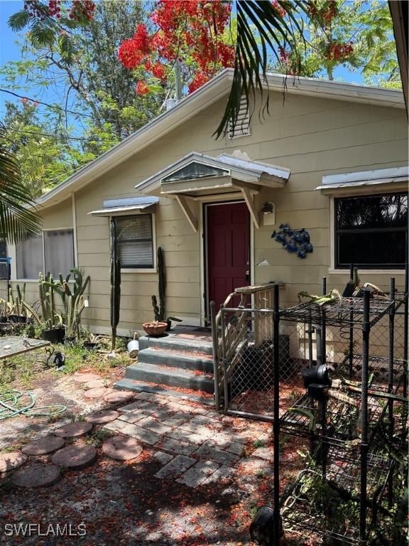 2739 Michigan Ave, Fort Myers, FL 33916 - view of front facade with a gate