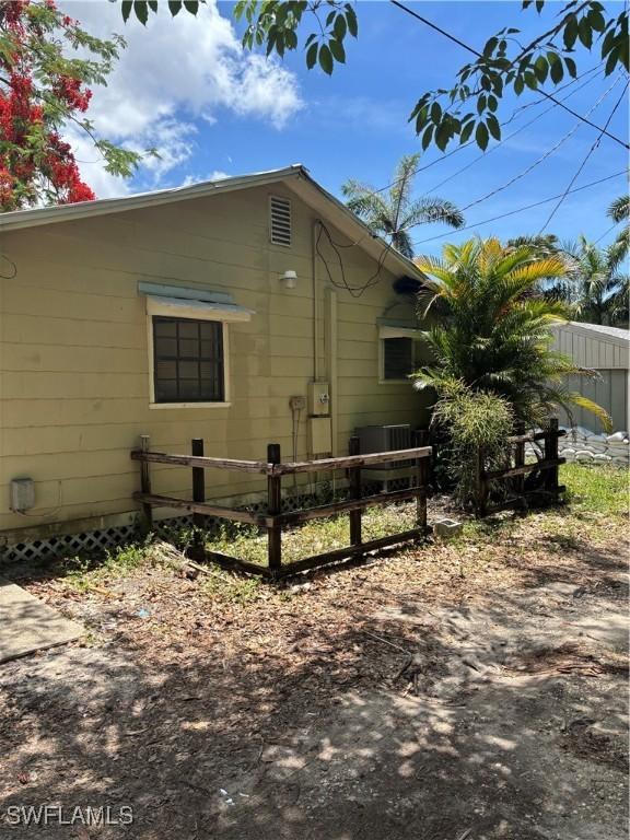 2739 Michigan Ave, Fort Myers, FL 33916 - view of side of home with central air condition unit