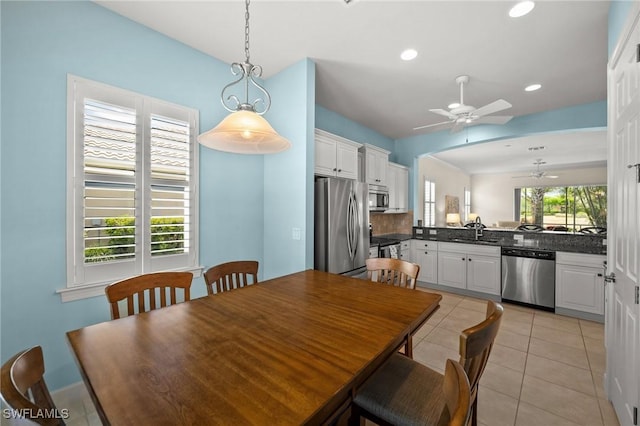 dining room with a ceiling fan, light tile patterned floors, and recessed lighting