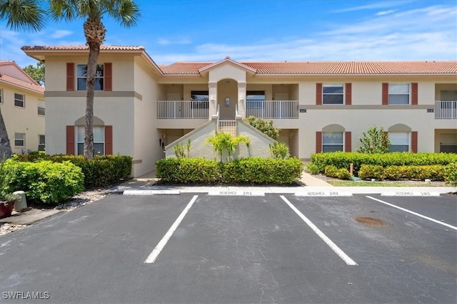 6645 Huntington Lakes Cir Unit 202, Naples, FL 34119 - view of property with uncovered parking