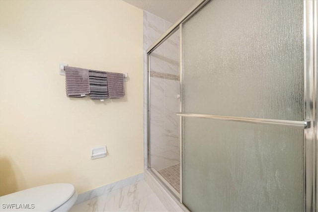 6645 Huntington Lakes Cir Unit 202, Naples, FL 34119 - full bath featuring baseboards, a shower stall, and marble finish floor