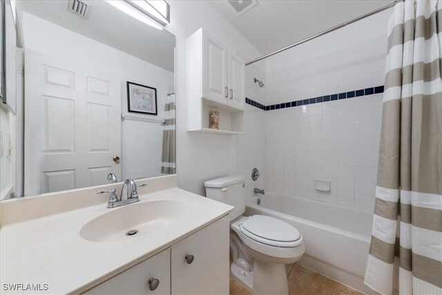6645 Huntington Lakes Cir Unit 202, Naples, FL 34119 - bathroom featuring visible vents, toilet, shower / tub combo, and vanity