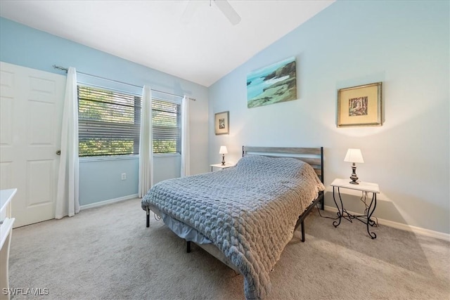 6645 Huntington Lakes Cir Unit 202, Naples, FL 34119 - bedroom with carpet floors, baseboards, a ceiling fan, and vaulted ceiling