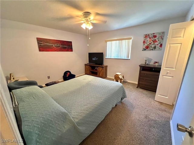 bedroom with baseboards, ceiling fan, and carpet flooring