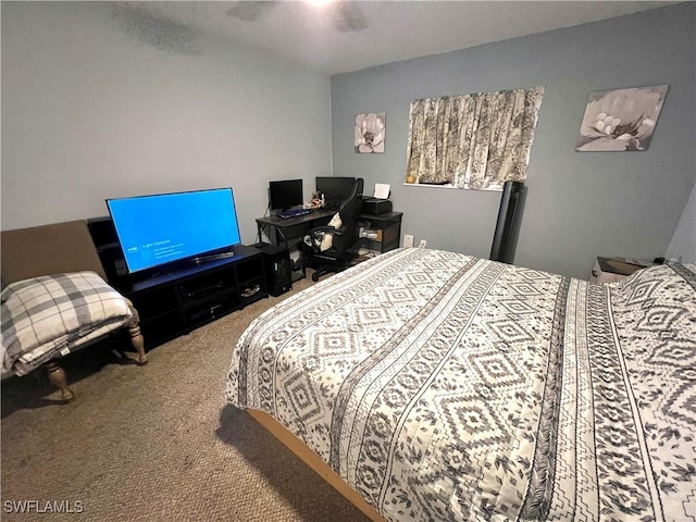 carpeted bedroom with a ceiling fan