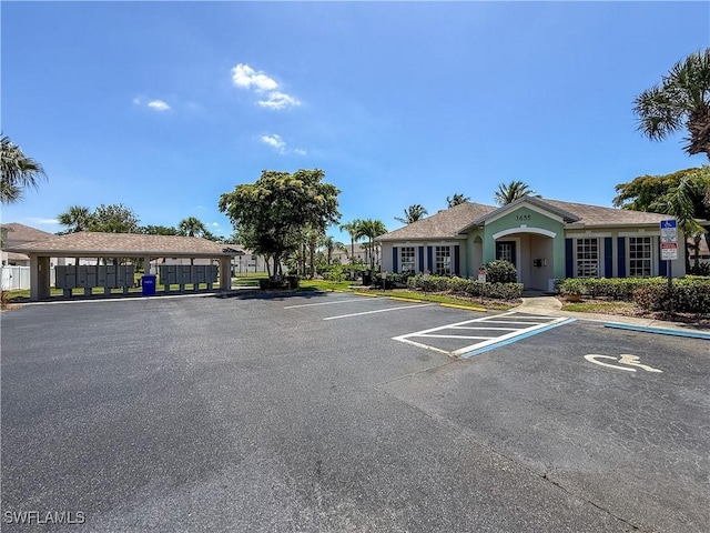 3646 Pine Oak Cir Unit 102, Fort Myers, FL 33916 - view of uncovered parking lot