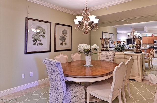 dining room featuring an inviting chandelier, baseboards, and crown molding