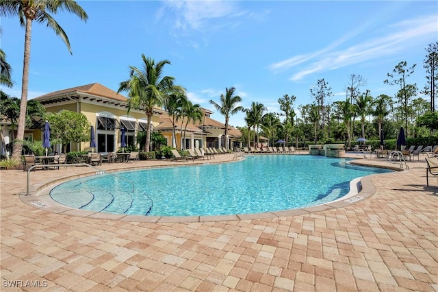 pool with a patio